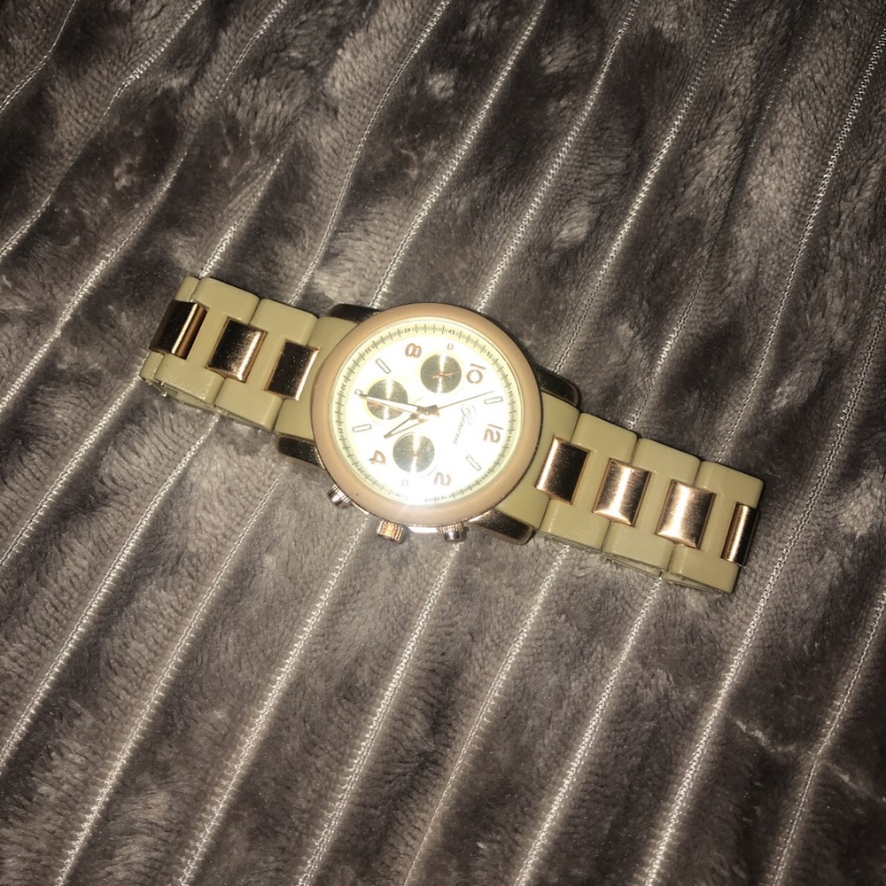 Tan and rose gold watch